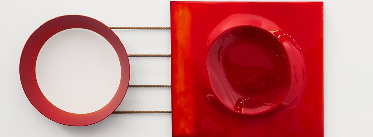 Modern sculptural work with layers of red luminous automotive paint on salvaged steel and aluminium